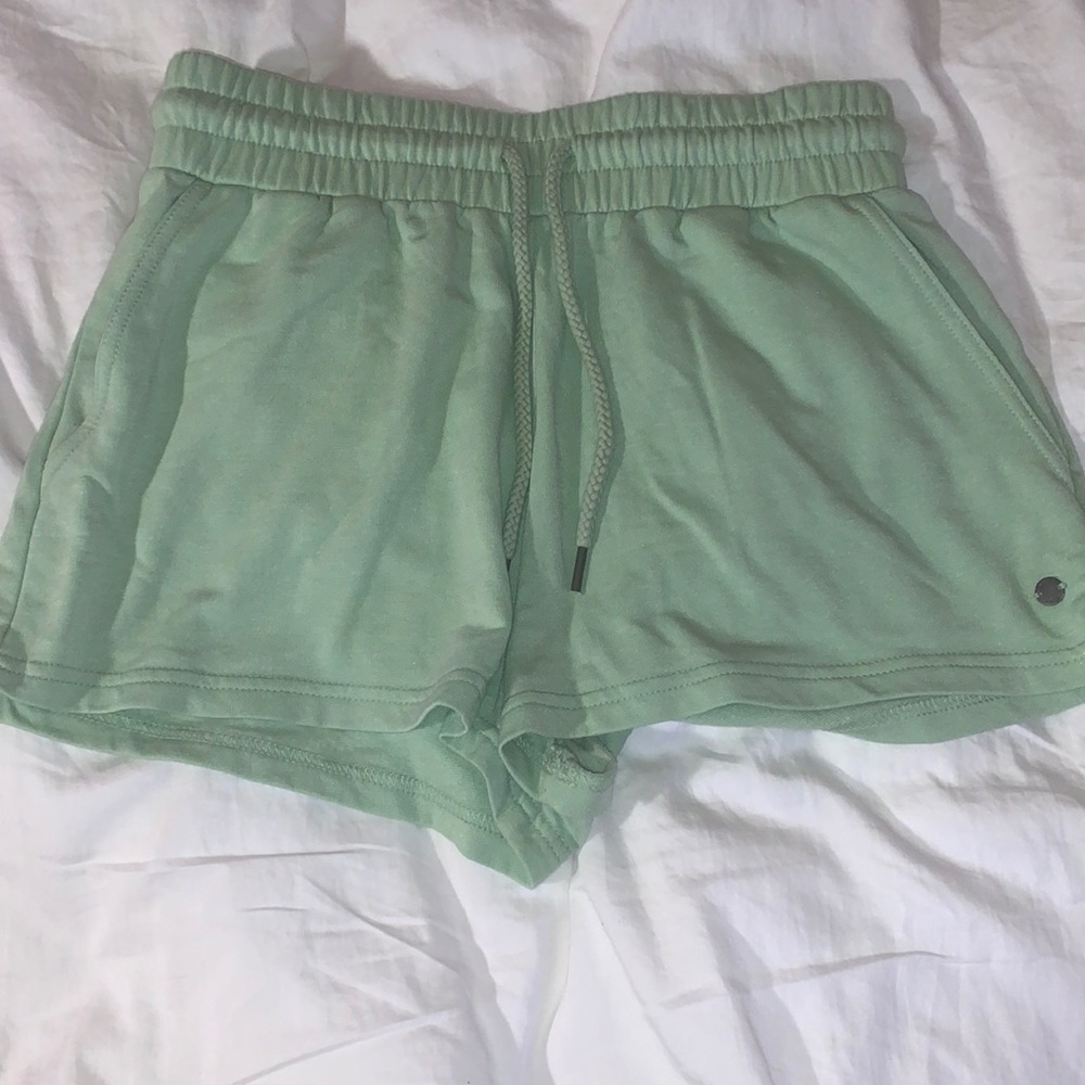 Roxy, green shorts in woman’s size medium. For $12 dollars